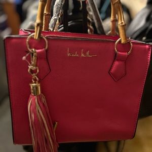 Nicole Miller hot pink tassel purse